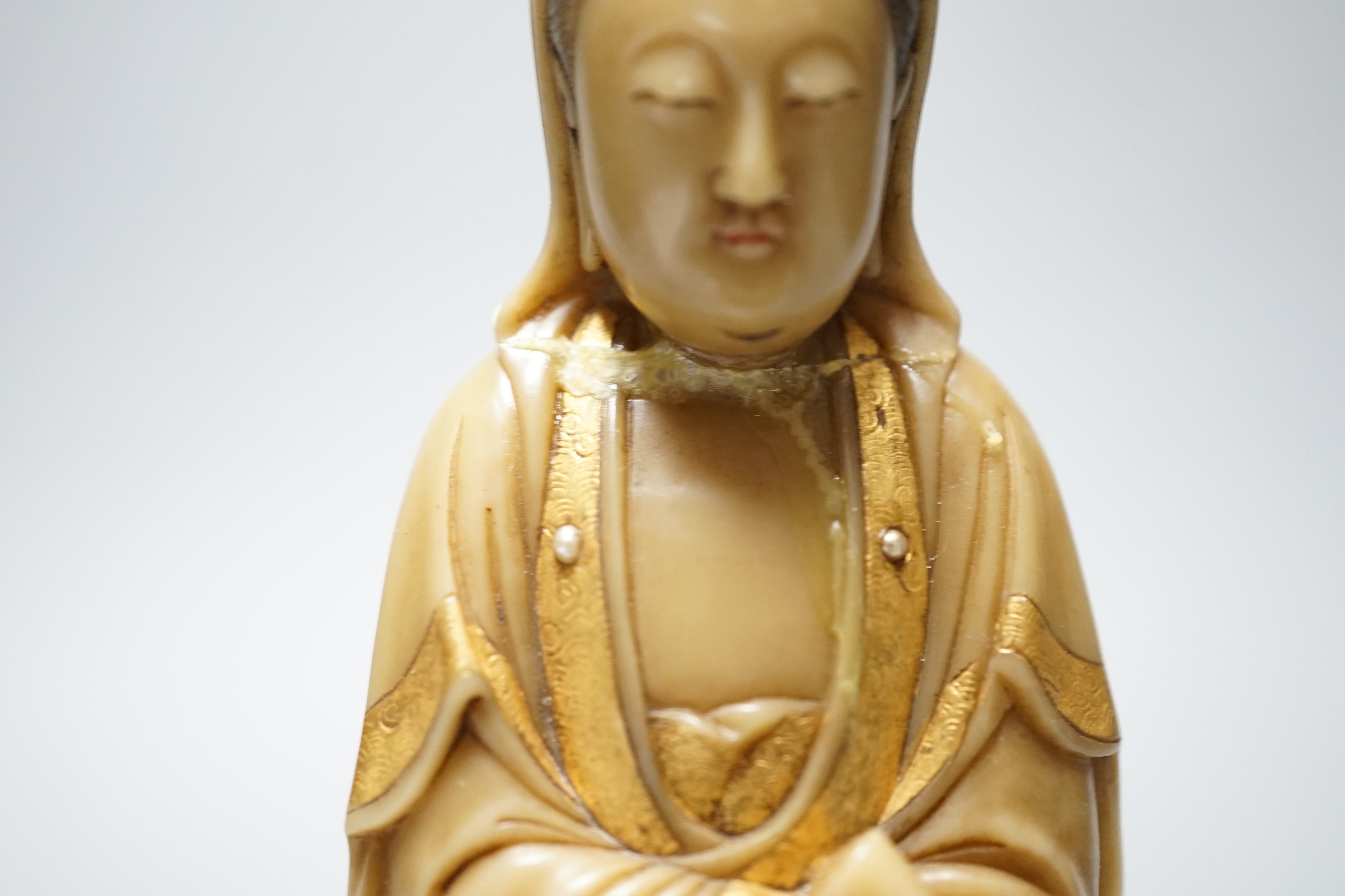 A Chinese gilded and polychrome soapstone figure of Guanyin, 16cm